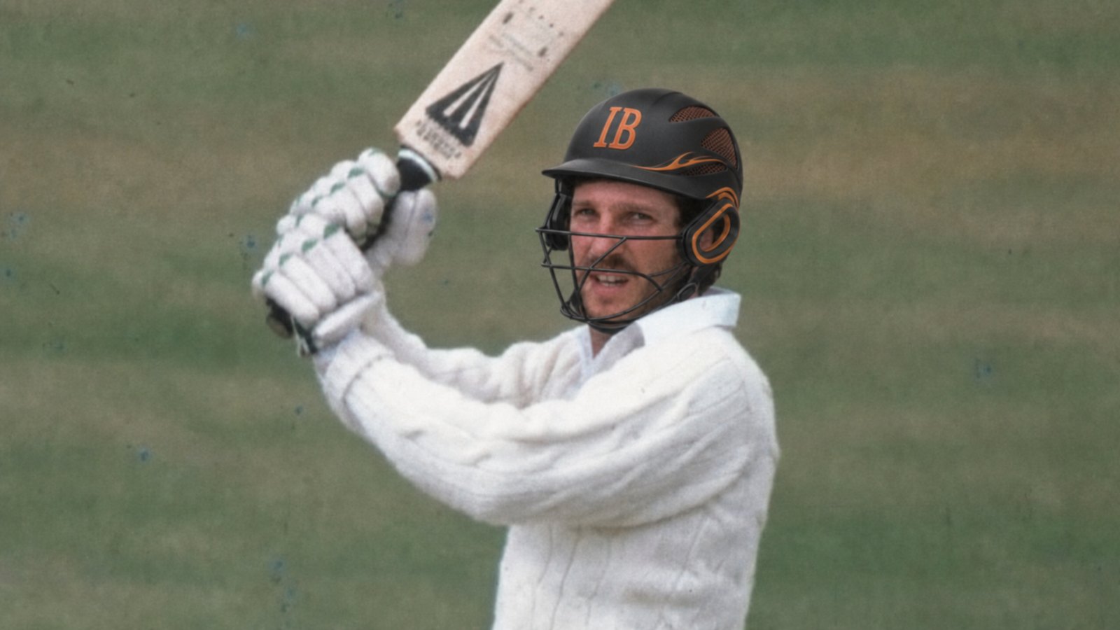 A cricketer batting in a WaughHead helmet