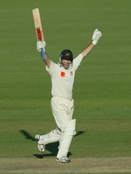 Steve Waugh raises his arms to celebrate a Test century