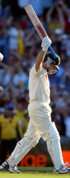 Steve Waugh acknowledges the crowd, bat raised