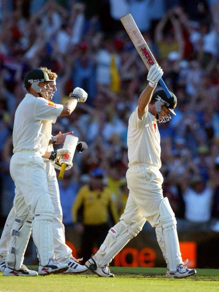 Steve Waugh celebrating a century at the crease