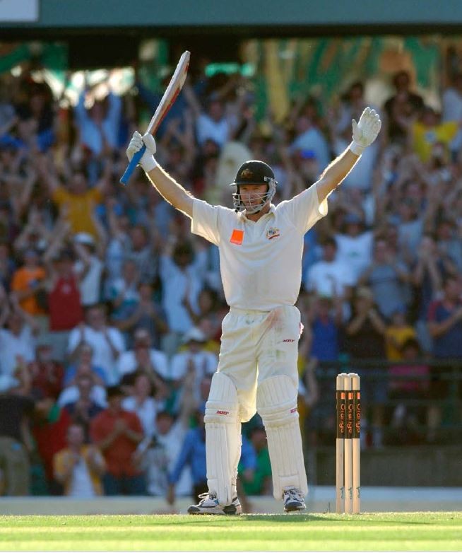 Steve Waugh celebrating a Test century in front of a packed crowd