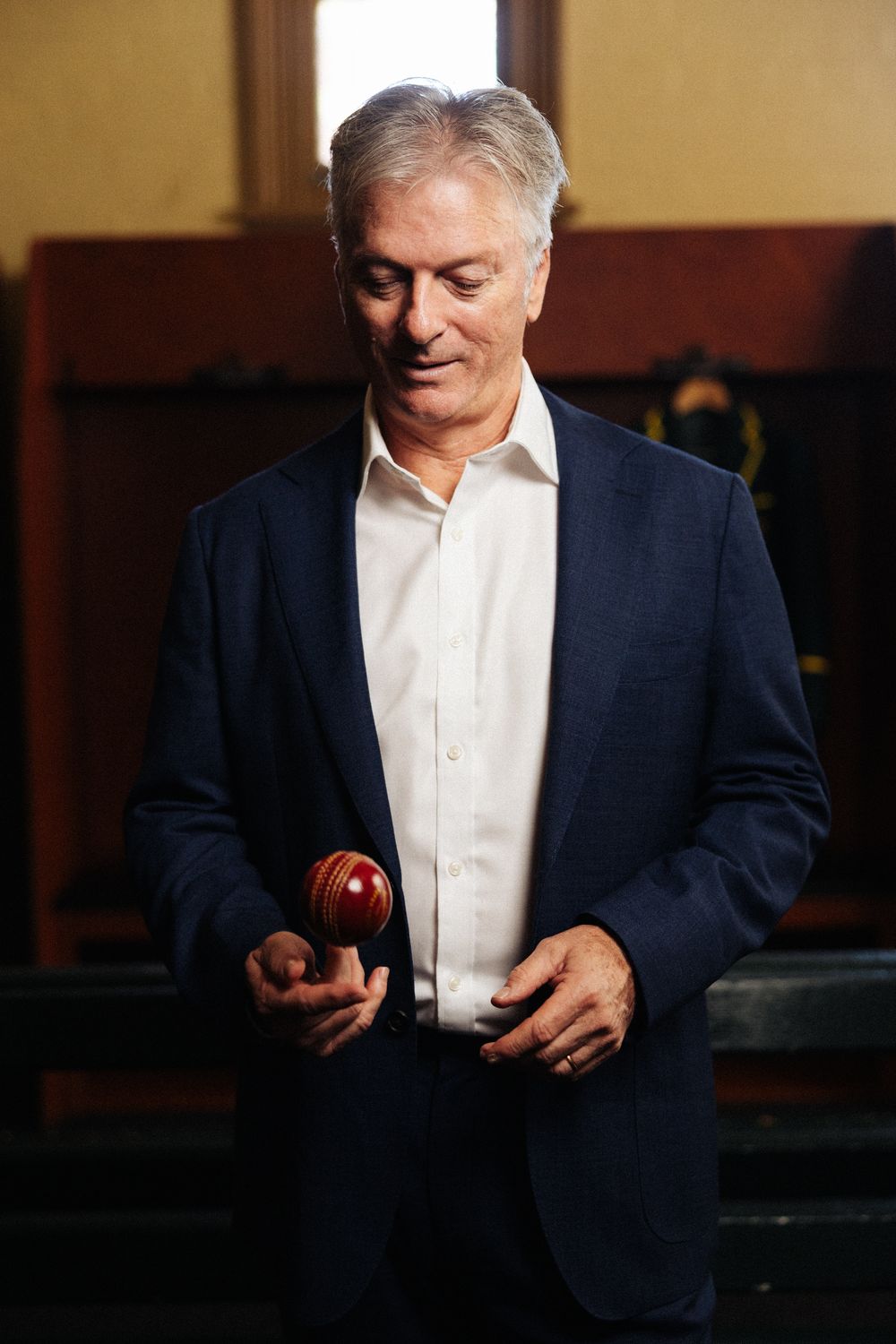 Steve Waugh, founder of WaughHead, holding a cricket ball